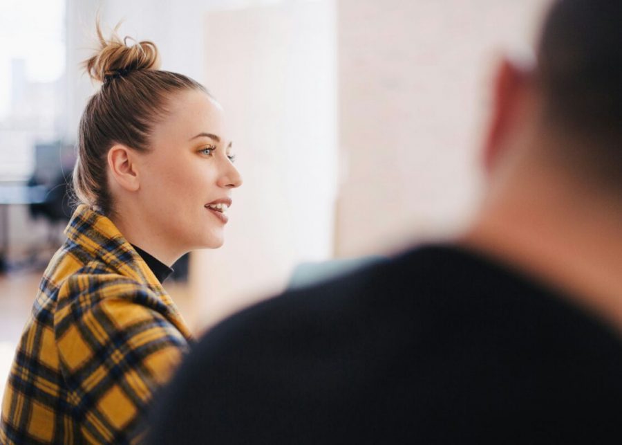 woman wearing yellow and black plaid shirt