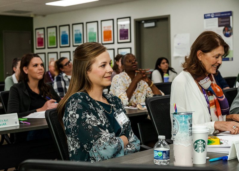 A group of people learning at a NAMI class