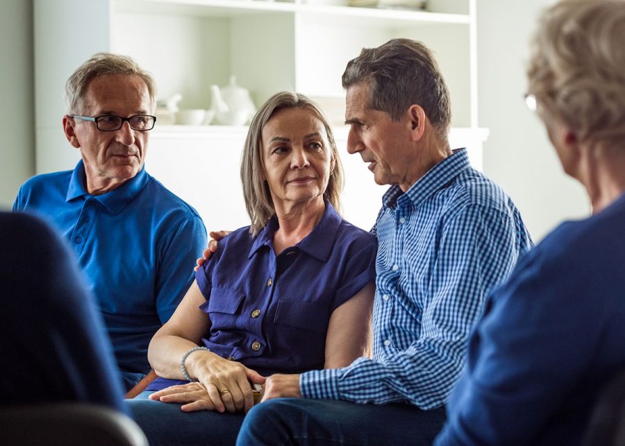 Concerned parents in a small group talking